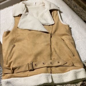 Vest, suede-like on exterior, soft &fuzzy interior